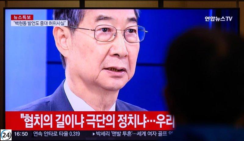 Justicia surcoreana solicita arresto de ex primer ministro Han Duck Soo.